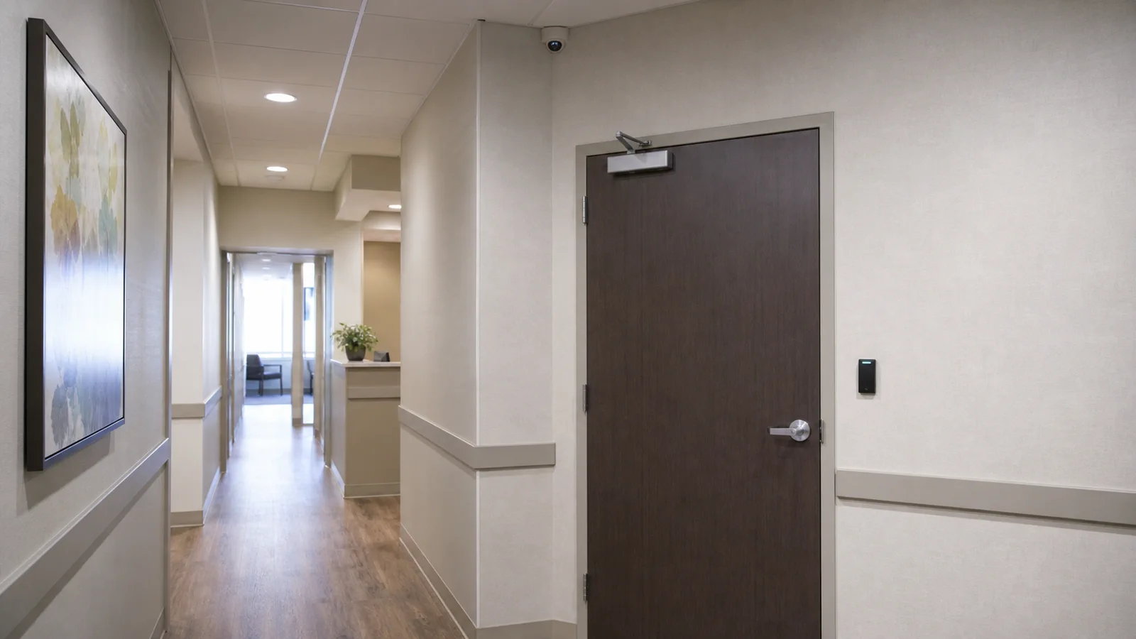 Credential-controlled staff door in a professional commercial office
